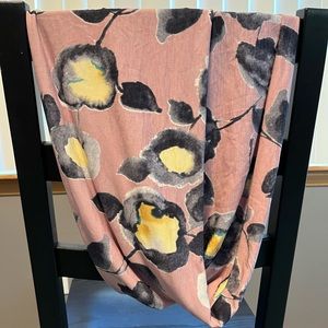 Infinity scarf that is Pink with a floral design. Stretchy and  comfortable.
